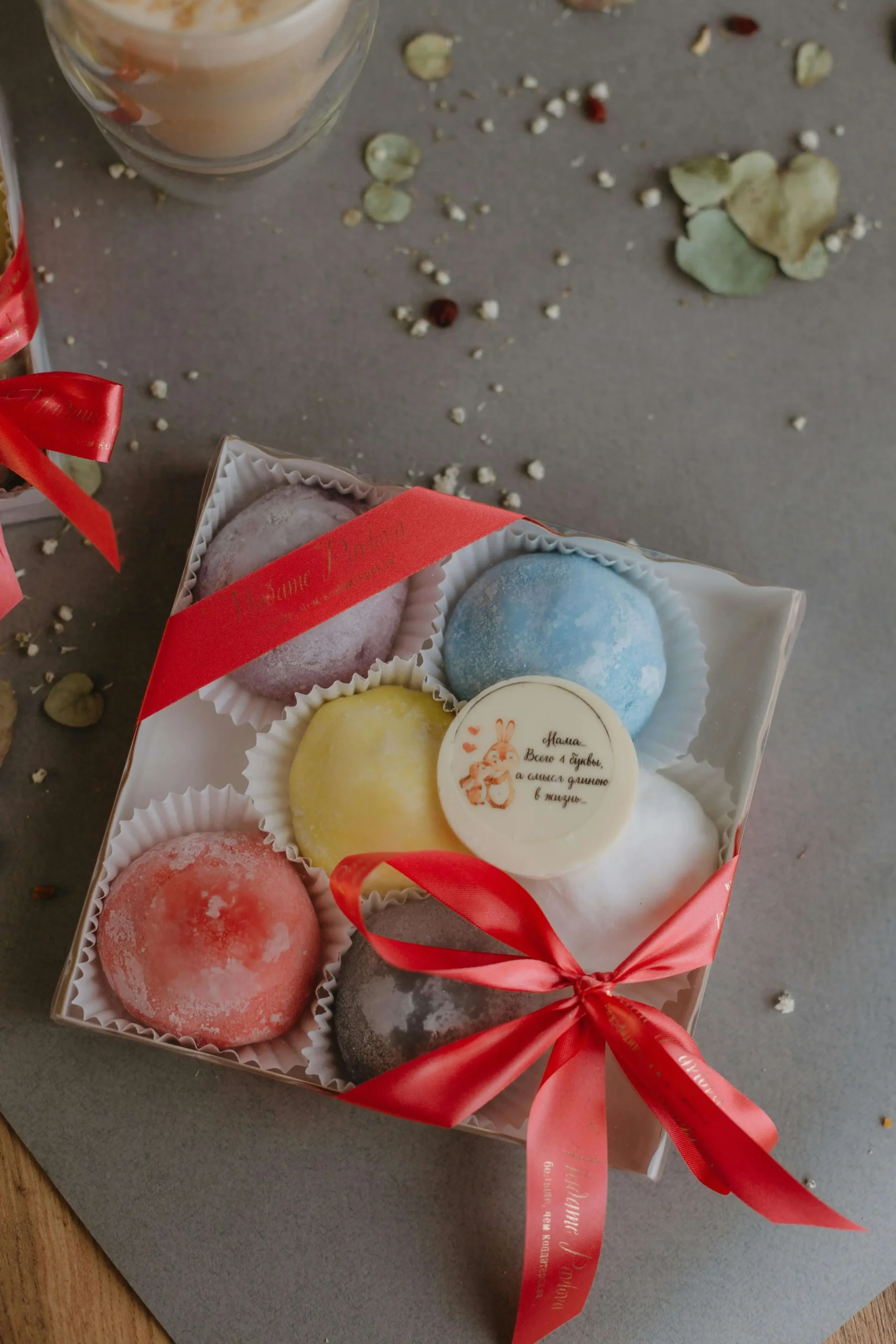A close-up of freshly made strawberry mochi (Ichigo Daifuku), showcasing its soft, chewy rice dough and a sweet, juicy strawberry filling.