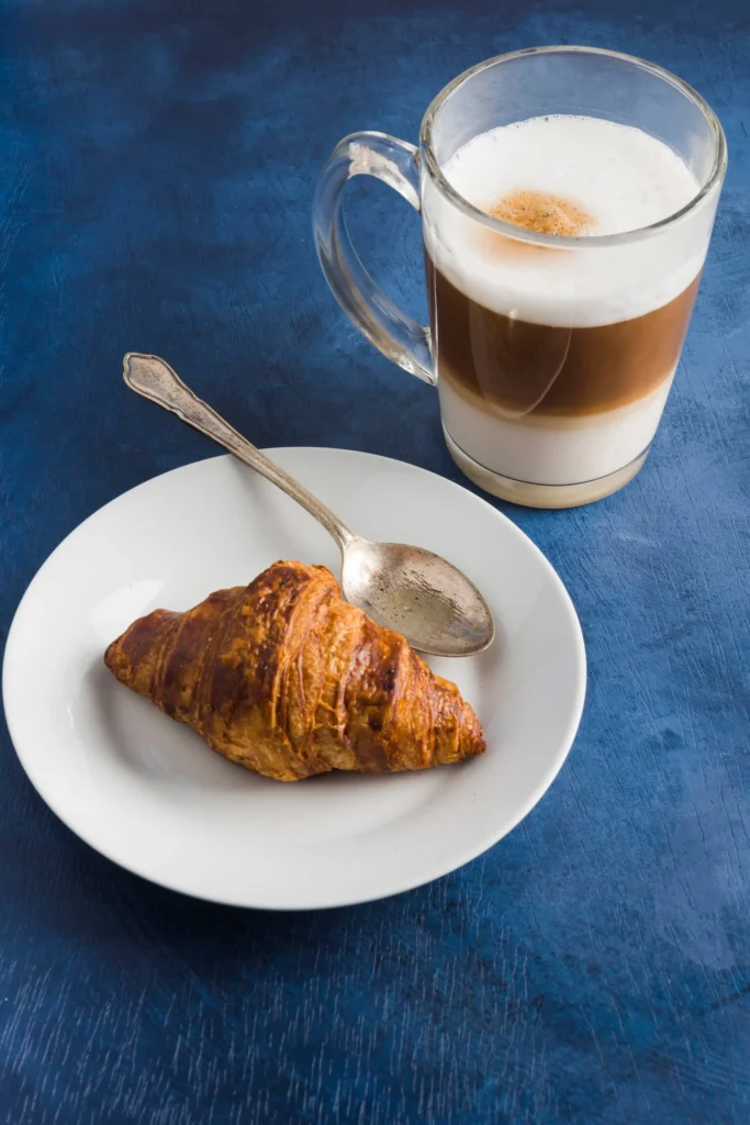 Outdoor Italian breakfast with Cappuccino e Cornetto