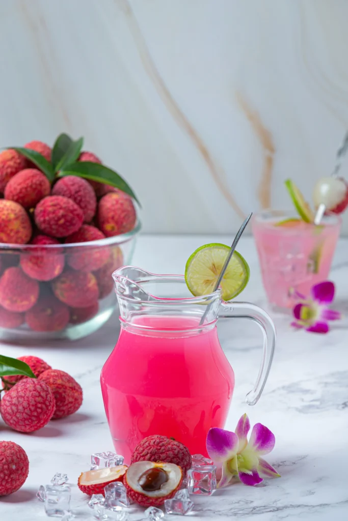 Refreshing Strawberry Lime Vodka Smash with ice, lime wedge, and fresh mint.