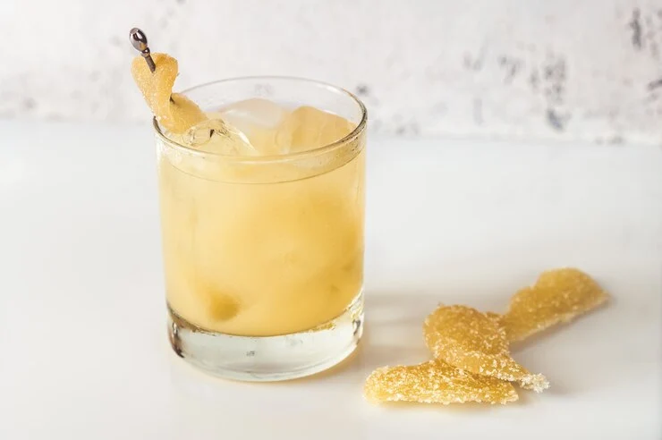 Golden Scotch Honey Highball cocktail sparkling in a tall glass with fresh ice.