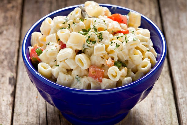 Hawaiian-style creamy macaroni salad in a colorful bowl